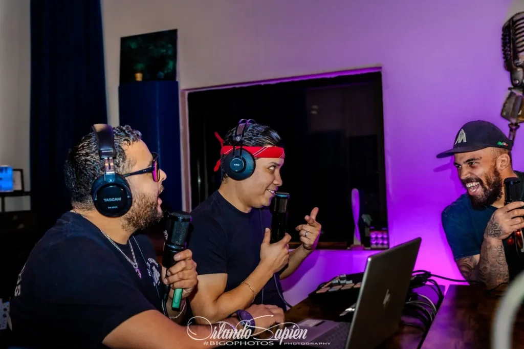 Misa and Chuy interviewing a guest on The TakeOver Show