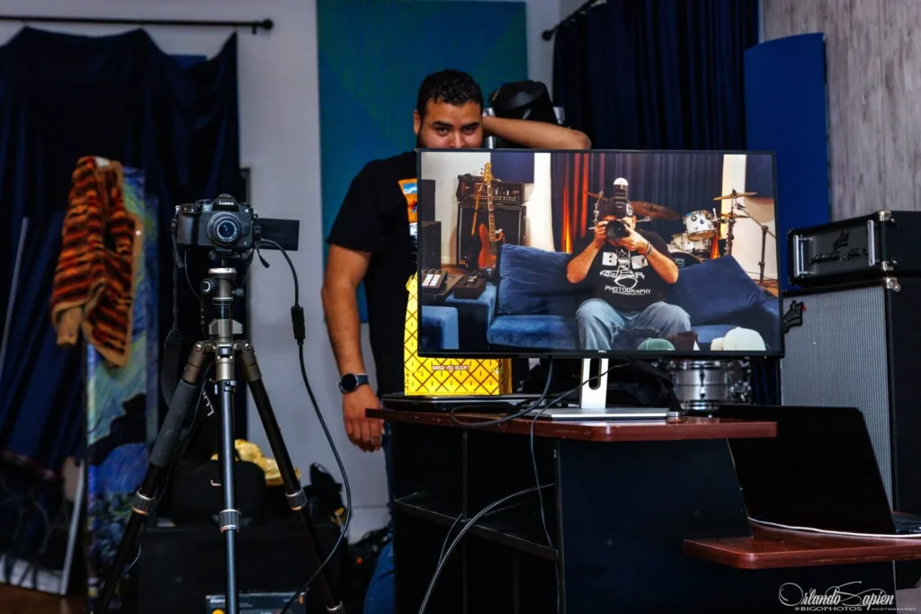 Camera and production monitor behind the scenes